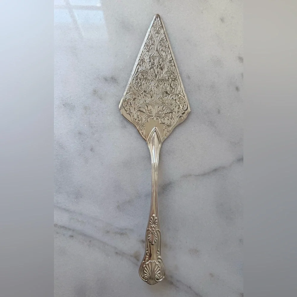 vintage silver-plated pie or cake server, frequently produced in Italy